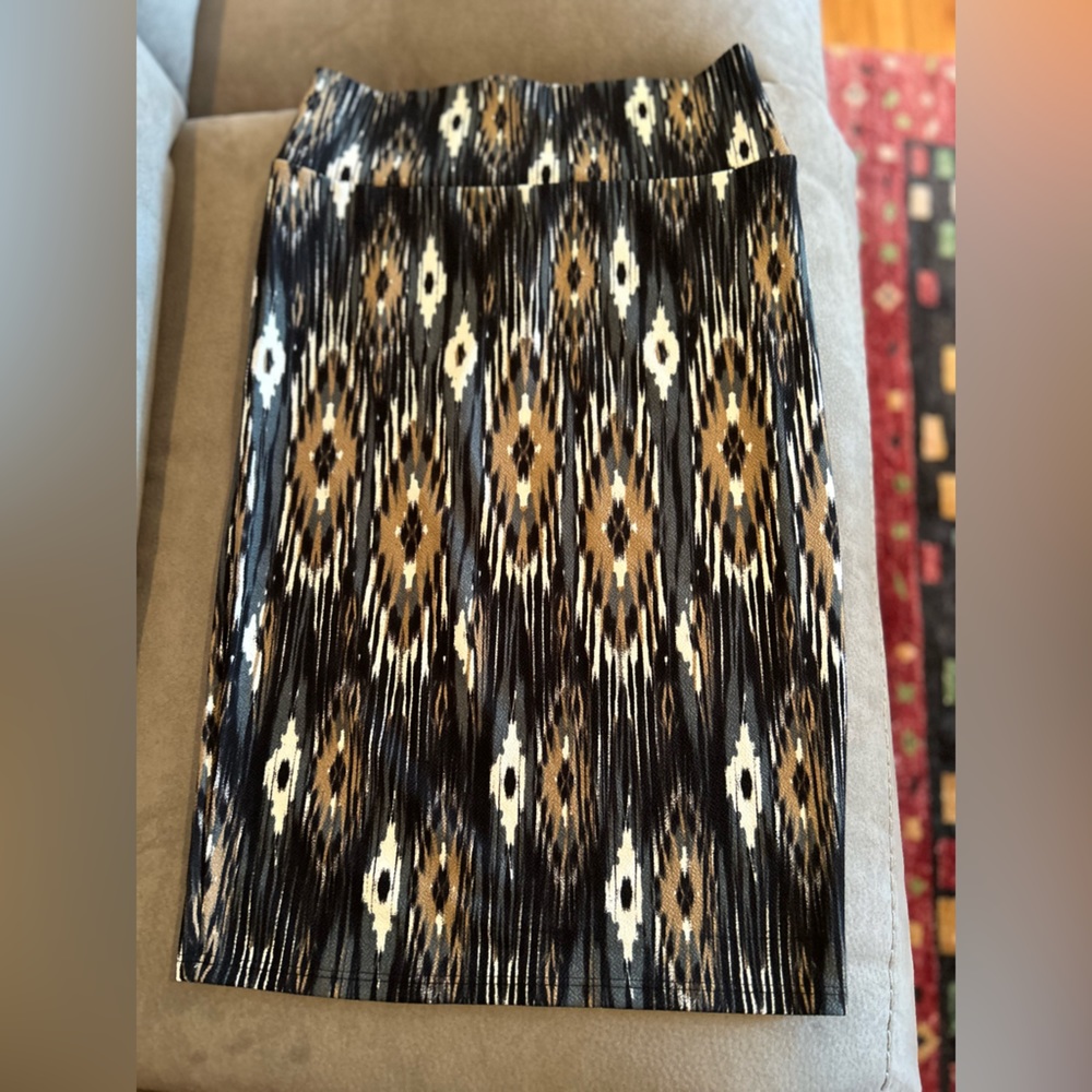 Pencil skirt, stretchy w/ elastic waist band.